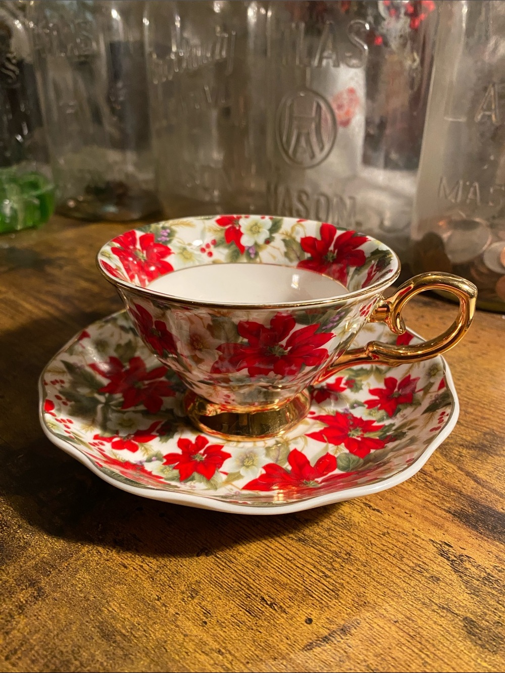 Festive Red Poinsettia Teacup and Saucer with Gold Trim